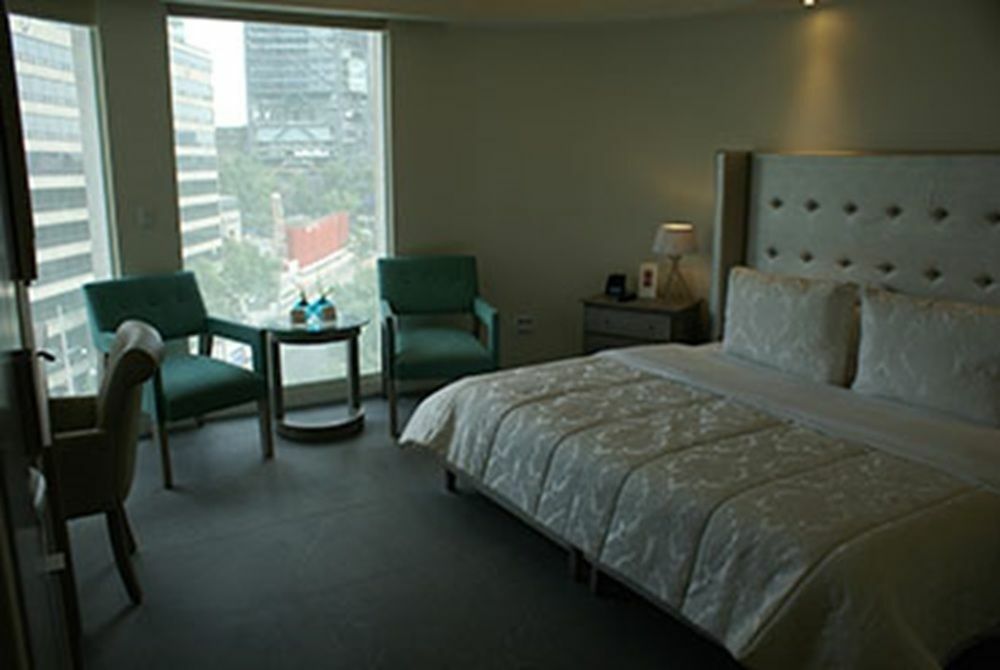 Suites Contempo Città del Messico Esterno foto A room at the hotel